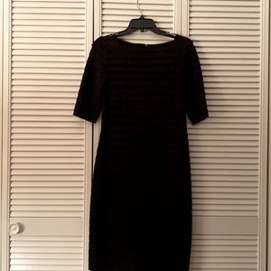 Black tailored cocktail dress with ribbed detail